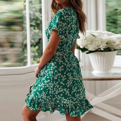 Elegantes Sommerkleid mit V-Ausschnitt und floralem Muster