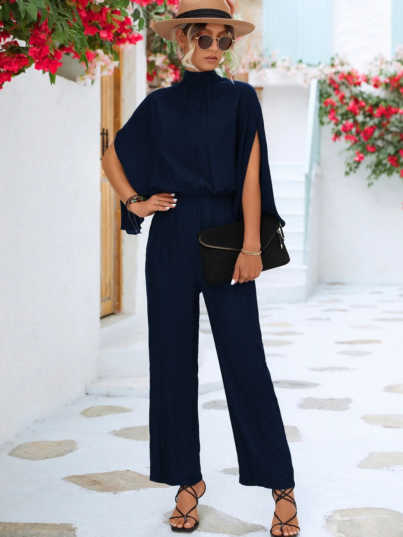 Eleganter Jumpsuit mit offenen Ärmeln und formellem Stehkragen