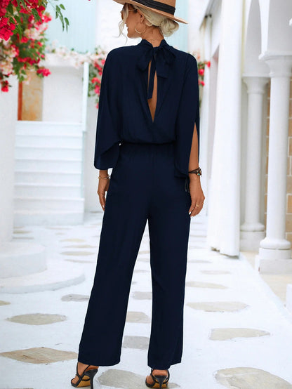 Eleganter Jumpsuit mit offenen Ärmeln und formellem Stehkragen