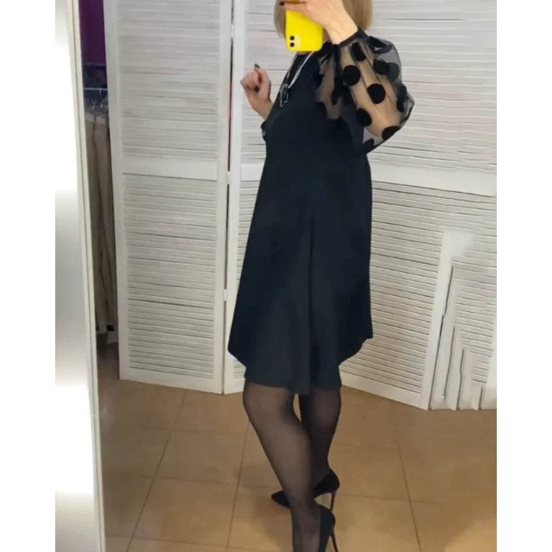 Janine Schwarzes elegantes gepunktetes Kleid
